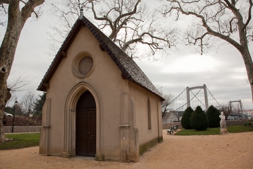 Little church with the bridge as a backdrop